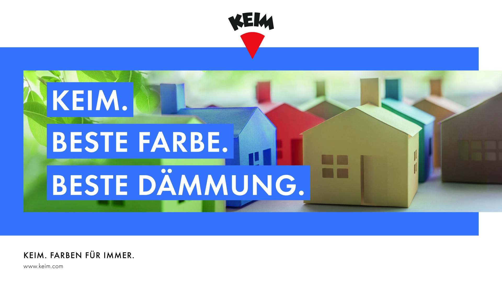 Papierbastelhäuser in verschiedenen Pastellfarben stehen auf einem Tisch mit grünen Blättern im Hintergrund. Der Text lautet: KEIM. Beste Farbe. Beste Dämmung. Das KEIM-Logo befindet sich oben.